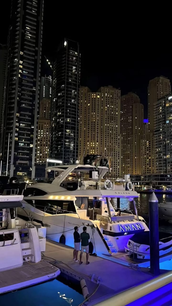 Luxury yacht marina lifestyle by night